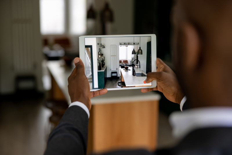 man holding tablet