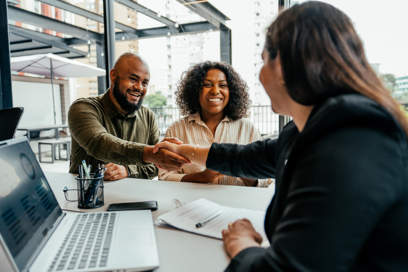 Couple closing real estate contract